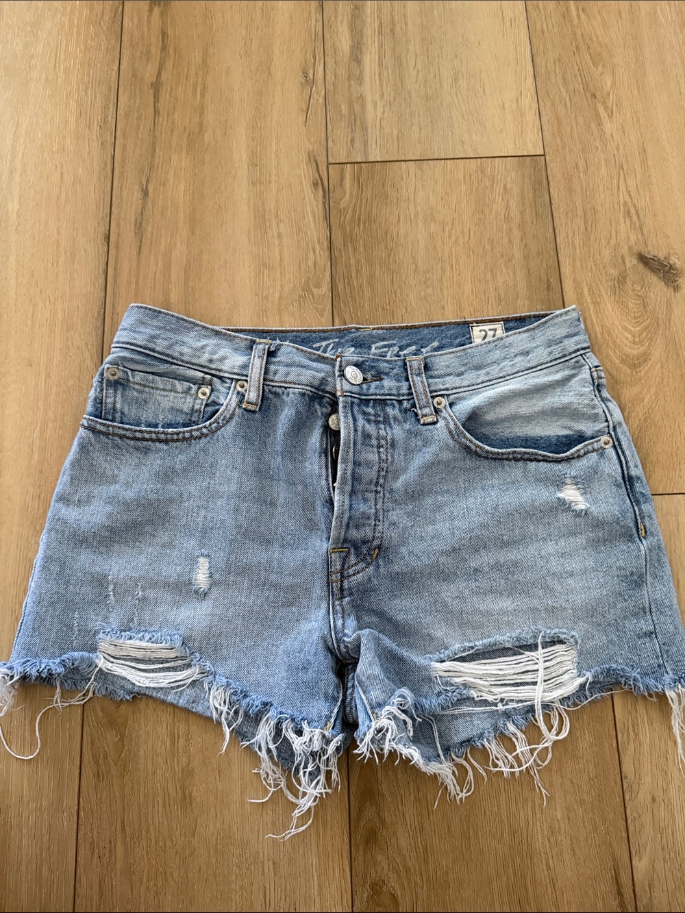 Light Blue Distressed Denim Shorts - Women's